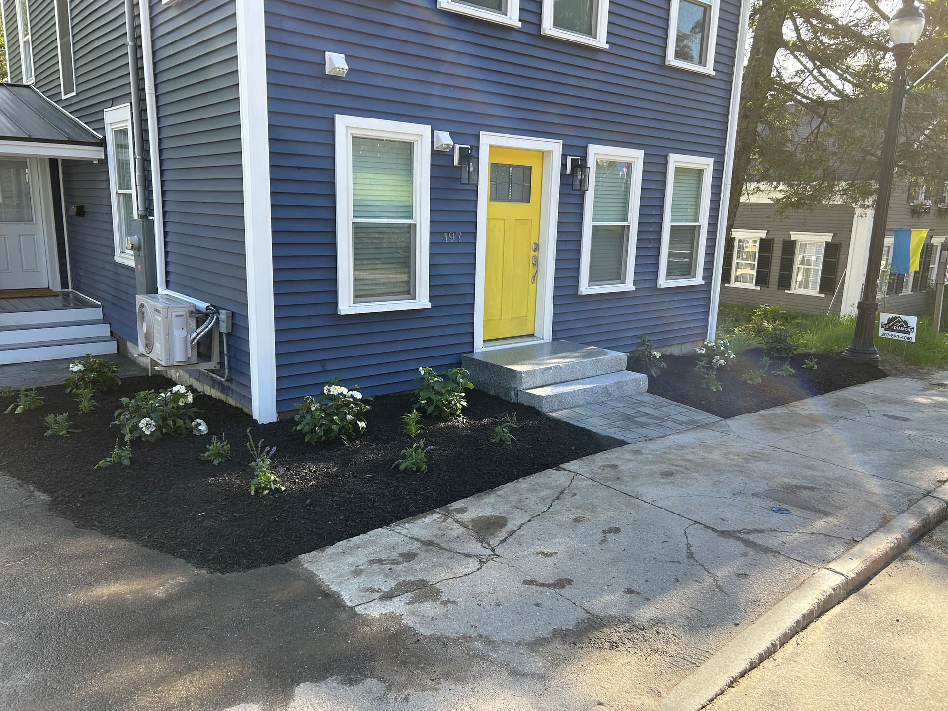 Downtown Bridgton Entry Gets Granite Steps, Pavers, and Fresh Plantings image